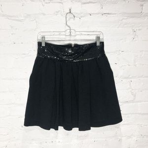 Black party skirt with metallic waistband by LaRok